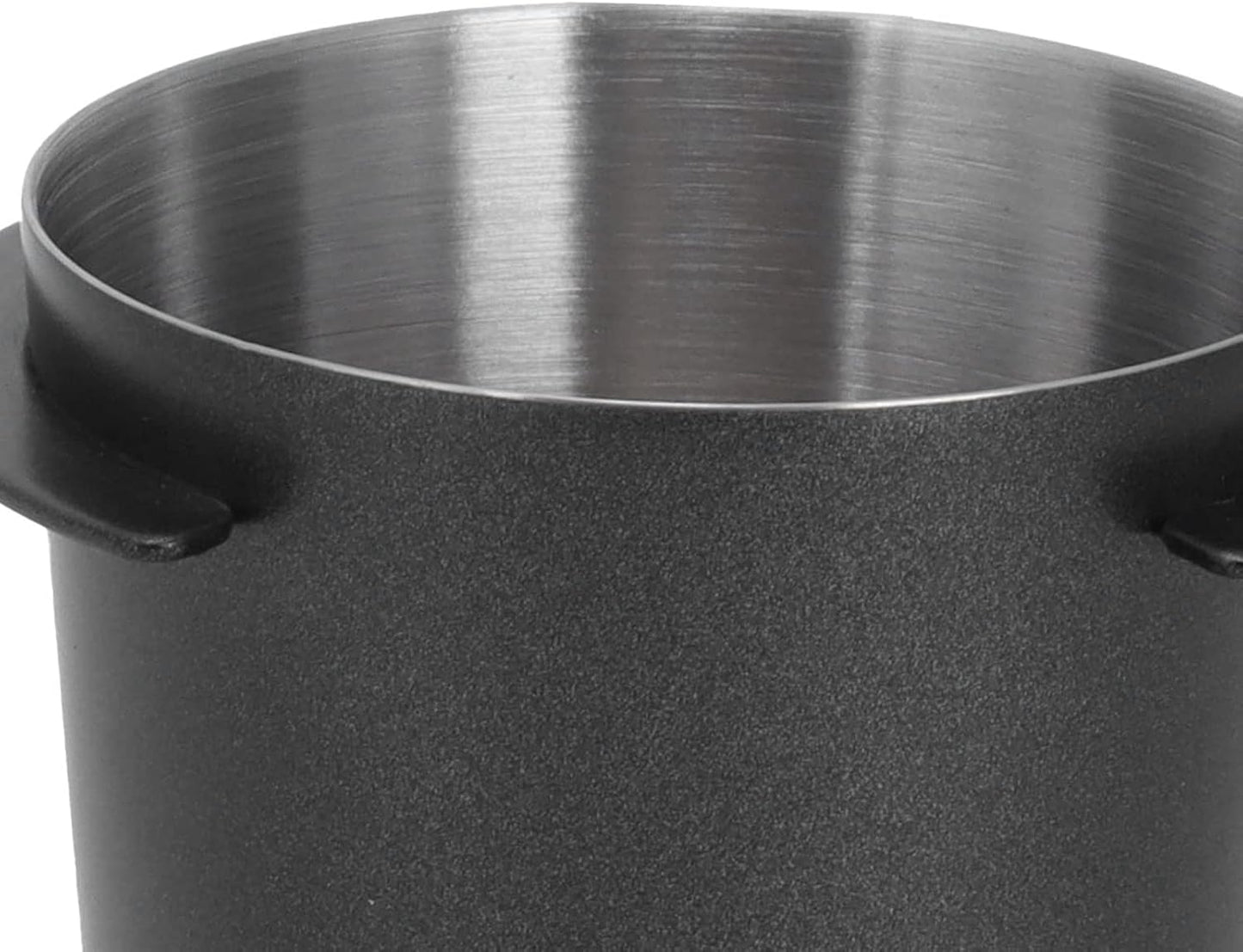 black coffee dosing cup close up